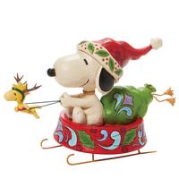 Peanuts by Jim Shore - Snoopy as Santa in Dog Bowl Sled - Dashing through the Holidays