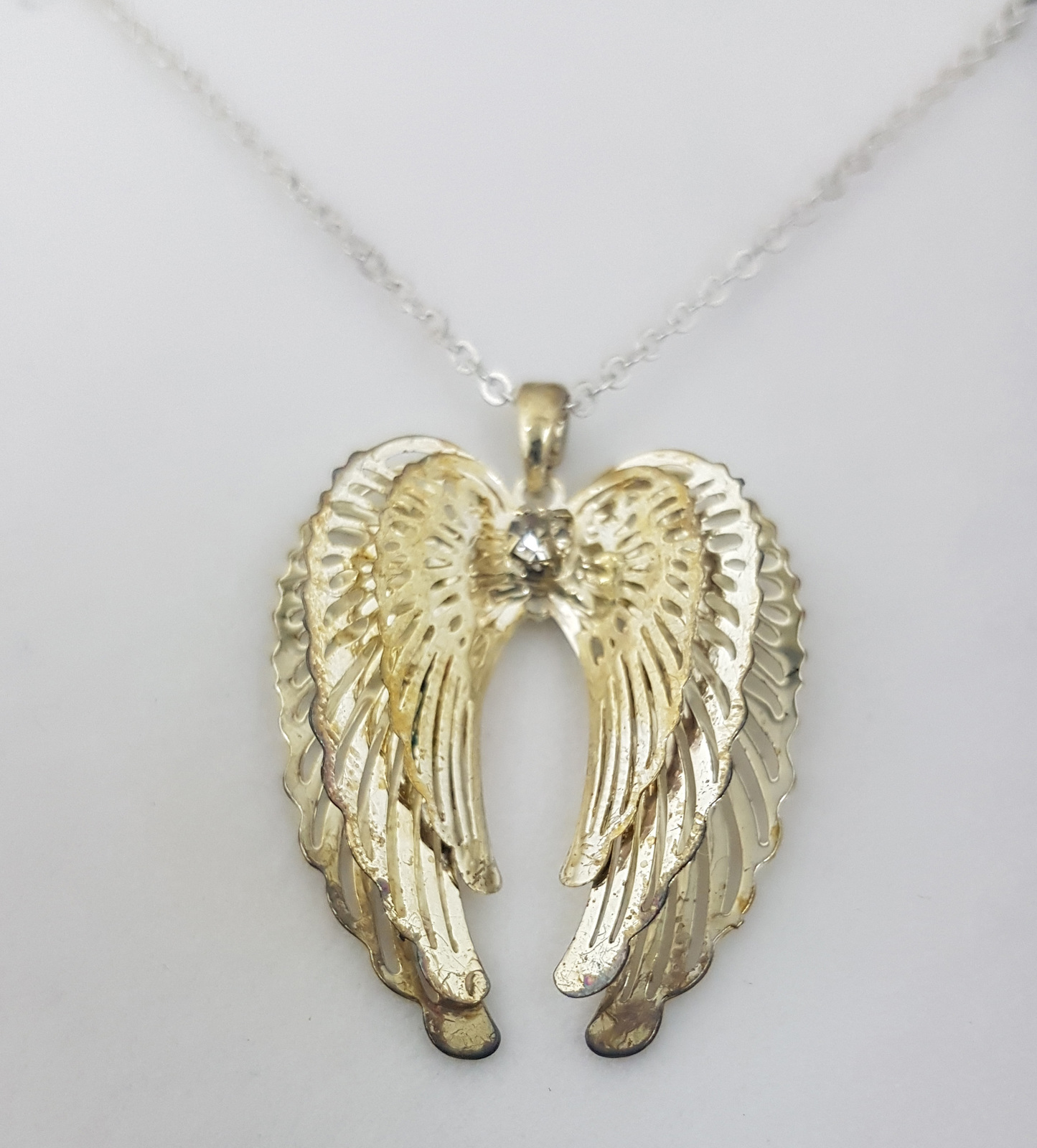 Equilibrium guardian clearance angel necklace