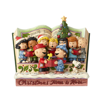 Jim Shore Christmas Storybook - Spreading Joy (Peanuts Collection)